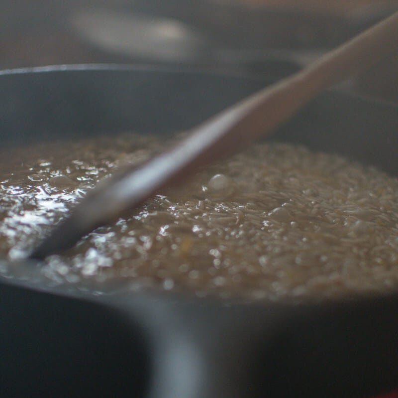brown soup in black cooking pot